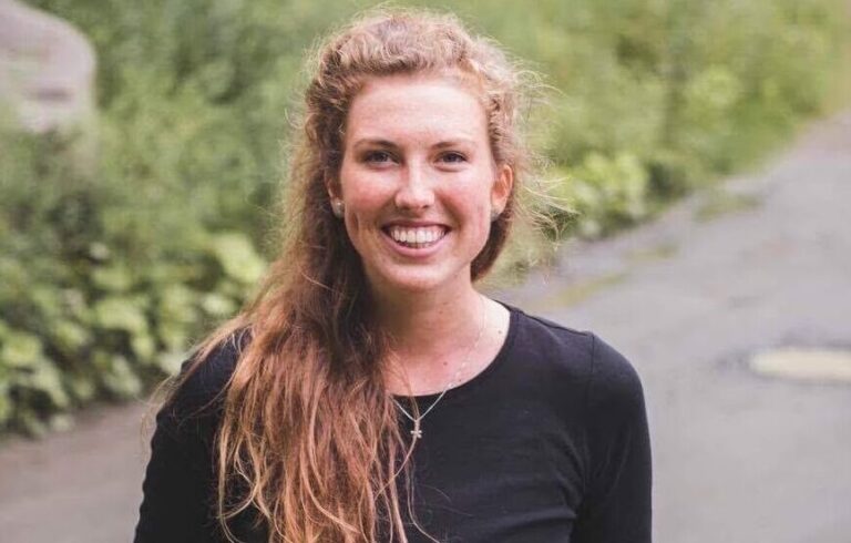 Former Muskoka Woods staff member Emily Thompson smiling for the camera
