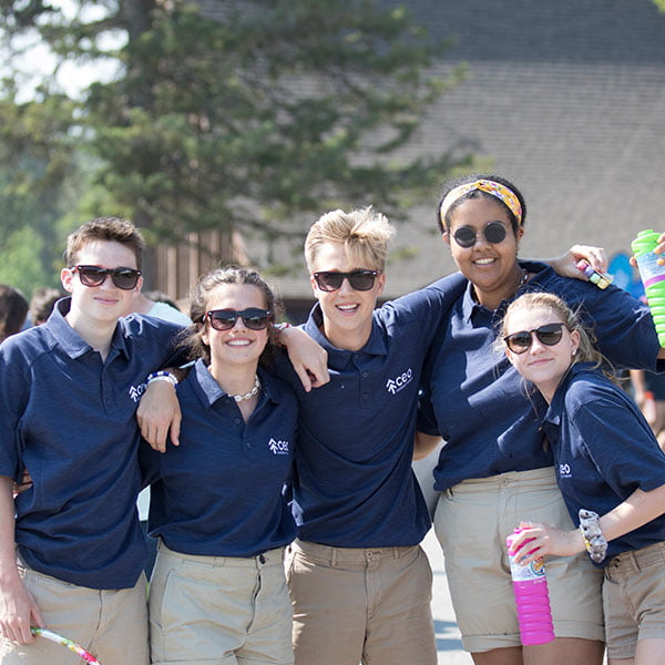 teens in blue shirts