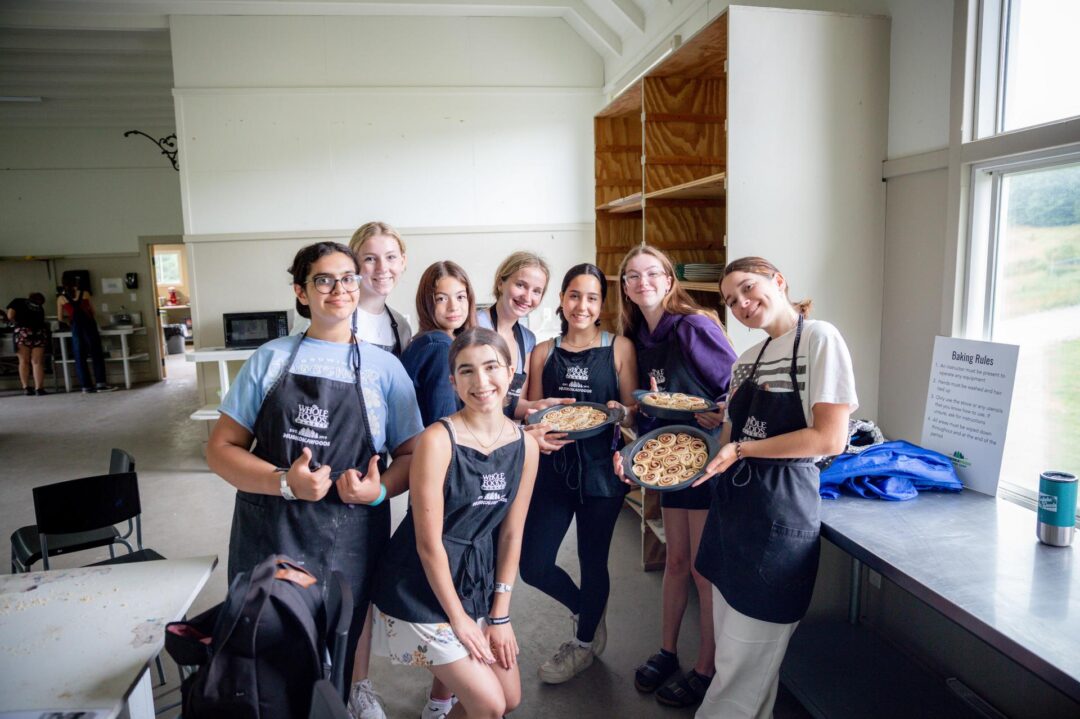 a group of girls and baked goods
