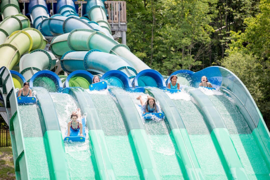 kids sliding down a waterslide