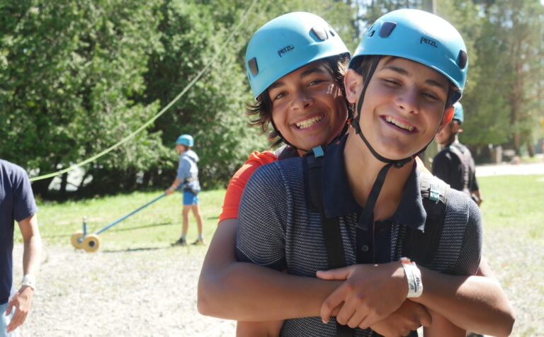 Two friends keeping homesickness at summer camp at bay