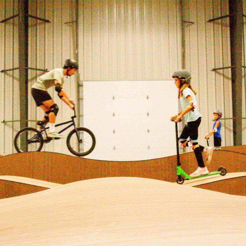 Kids playing on a pump track